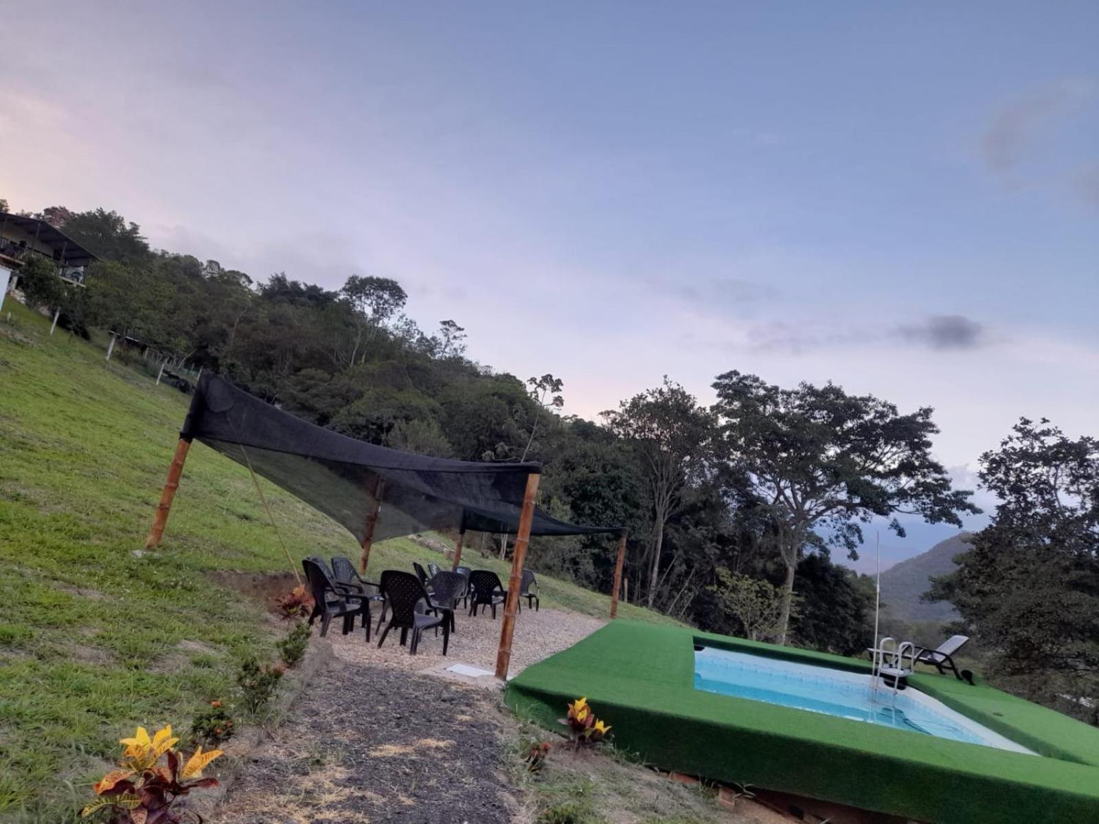 Cabana Alto De Luna Vifamiliar La Vega  Bagian luar foto